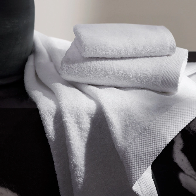 elegantly folded bath towels
