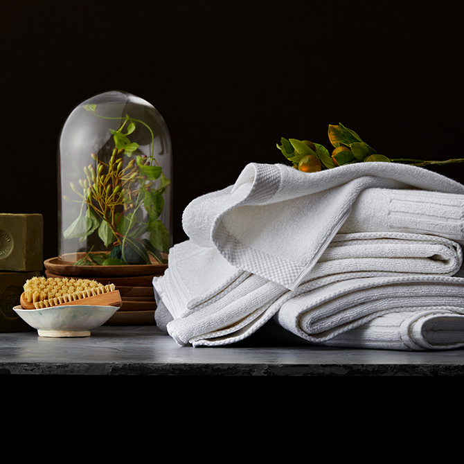 elegantly folded bath towels